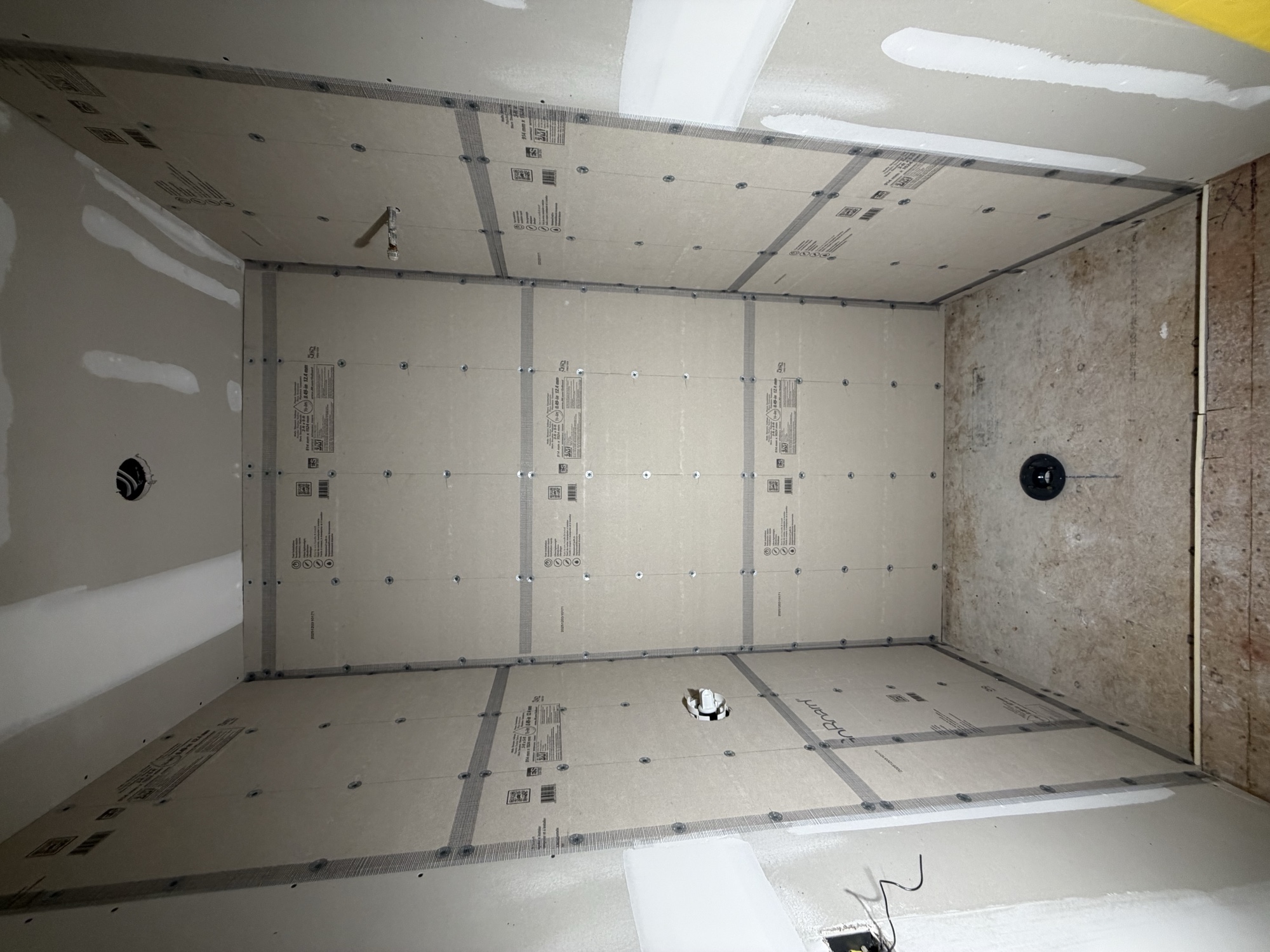 Bathroom shower cement-board substrate stage — before tile installation by Konar Bros Tile Co. Tampa Bay